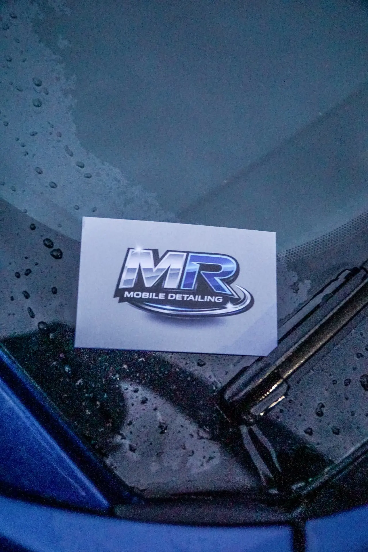 MR Mobile Detailing business card on a freshly washed car windshield